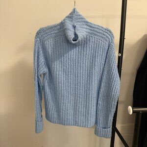 Light blue cable knit sweater, size small.